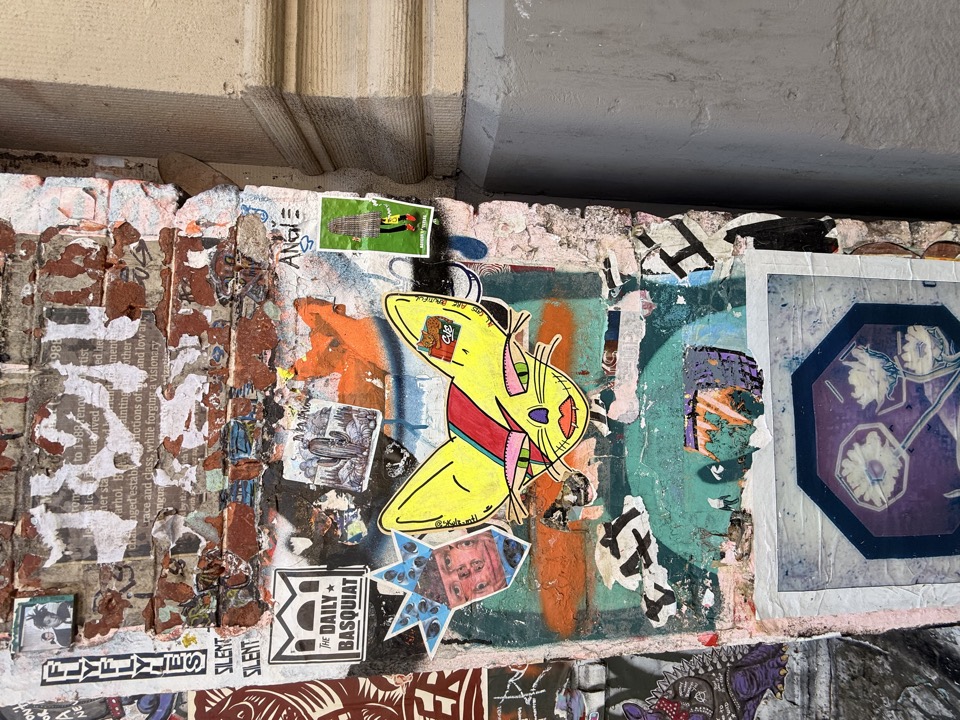 Street art layered poster wall