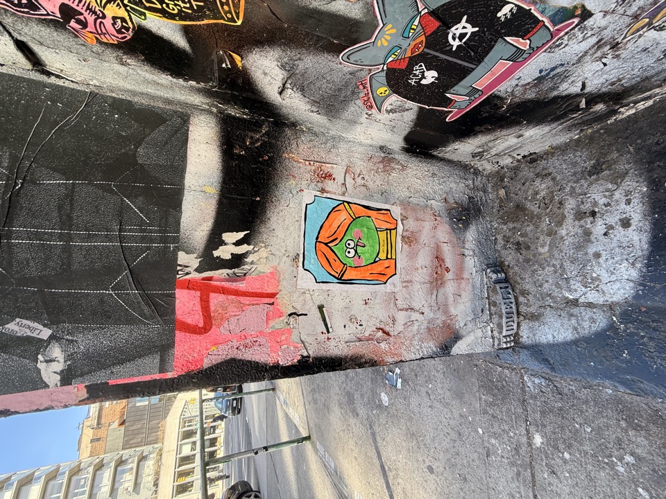 Street art wall and city street corner