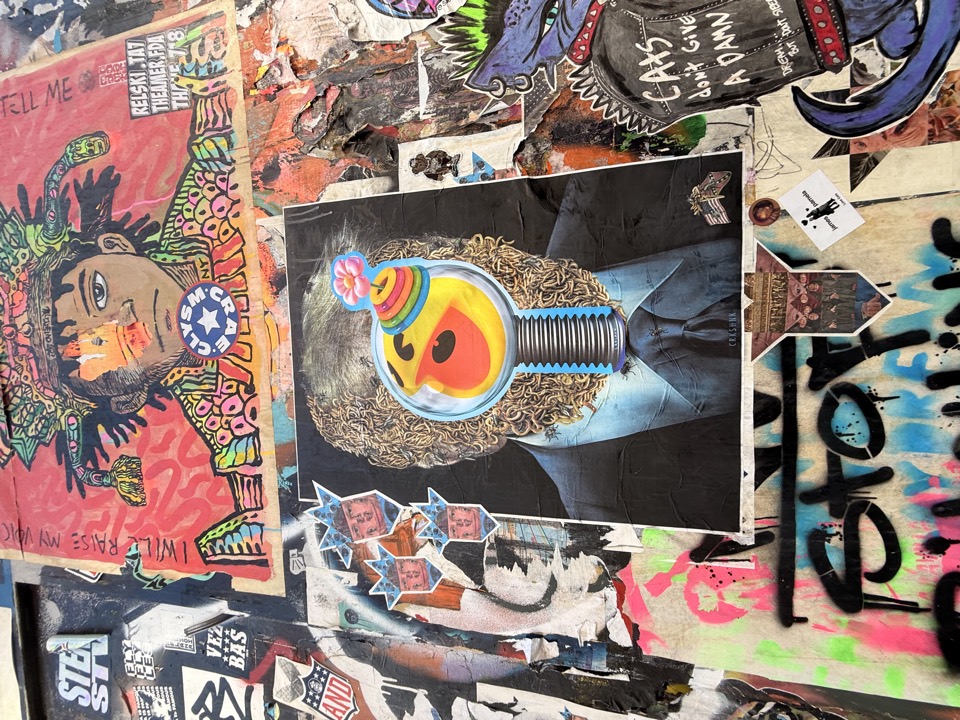 Street art yellow cat collage